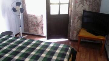 Фото номера Бюджетный трехместный номер Гостиница Nizhnee Makopse Guest House г. Макопсе 4