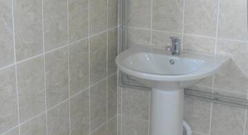 Фото номера Бюджетный трехместный номер Гостиница Nizhnee Makopse Guest House г. Макопсе 7